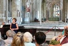 A recital at the Nave Crossing, showing the view to the east
