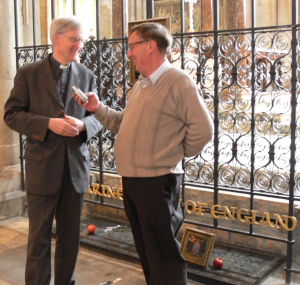 Canon Jonathan Baker talking to John Keily at Katharine of Aragon's tomb.